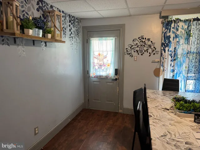 a view of a hallway with workspace