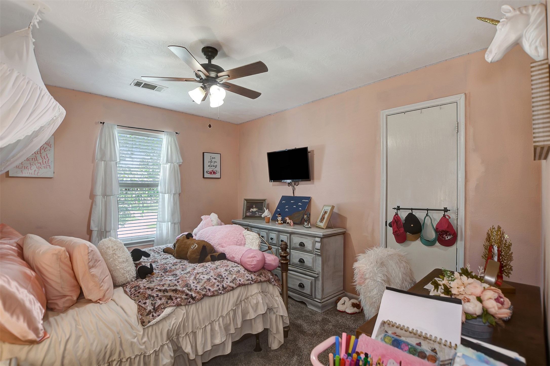 25401 Hunting Trail Magnolia, TX 77355 - Photo 29 of 42 a bedroom with a bed and a window