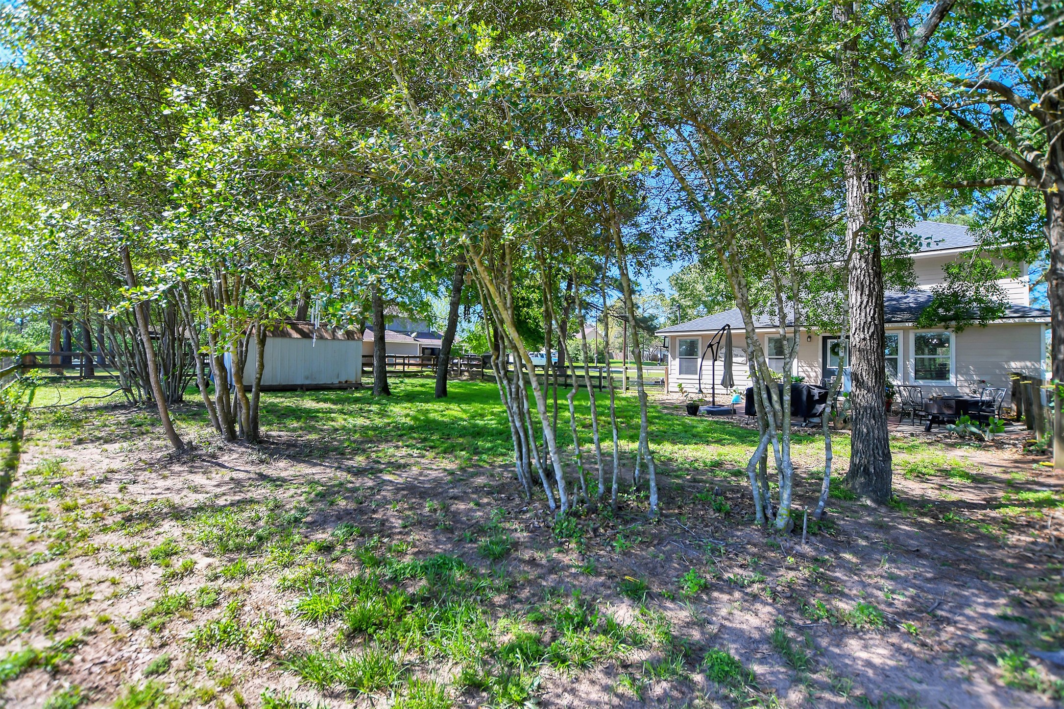 25401 Hunting Trail Magnolia, TX 77355 - Photo 36 of 42 a view of house with a backyard