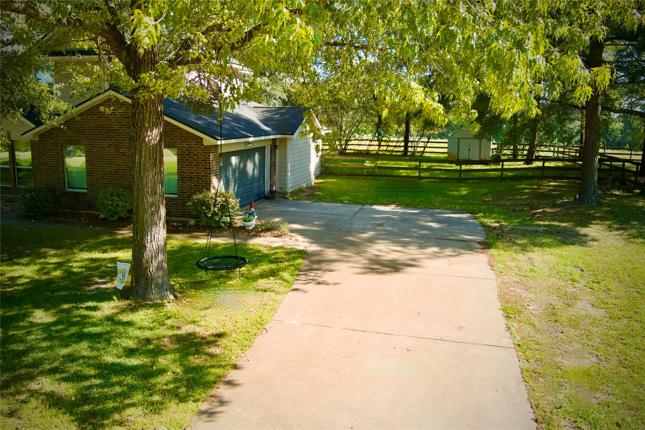 25401 Hunting Trail Magnolia, TX 77355 - Photo 42 of 42 a view of a yard with plants and trees