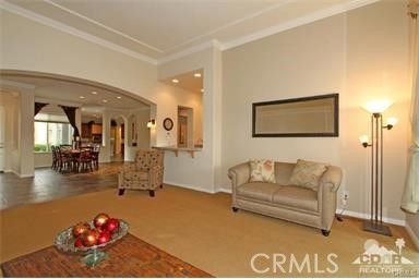 a living room with furniture and a table