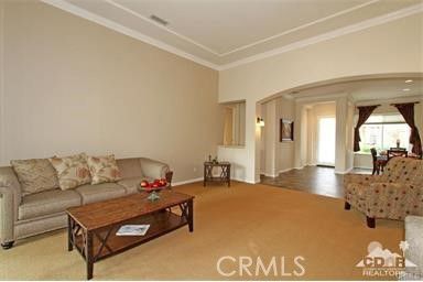 a living room with furniture and a couch