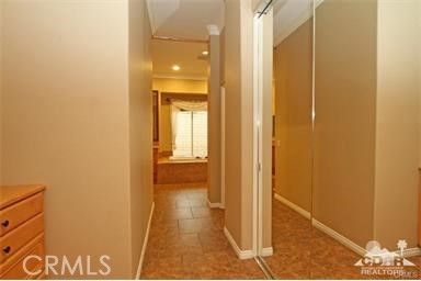 a view of a bathroom from a hallway