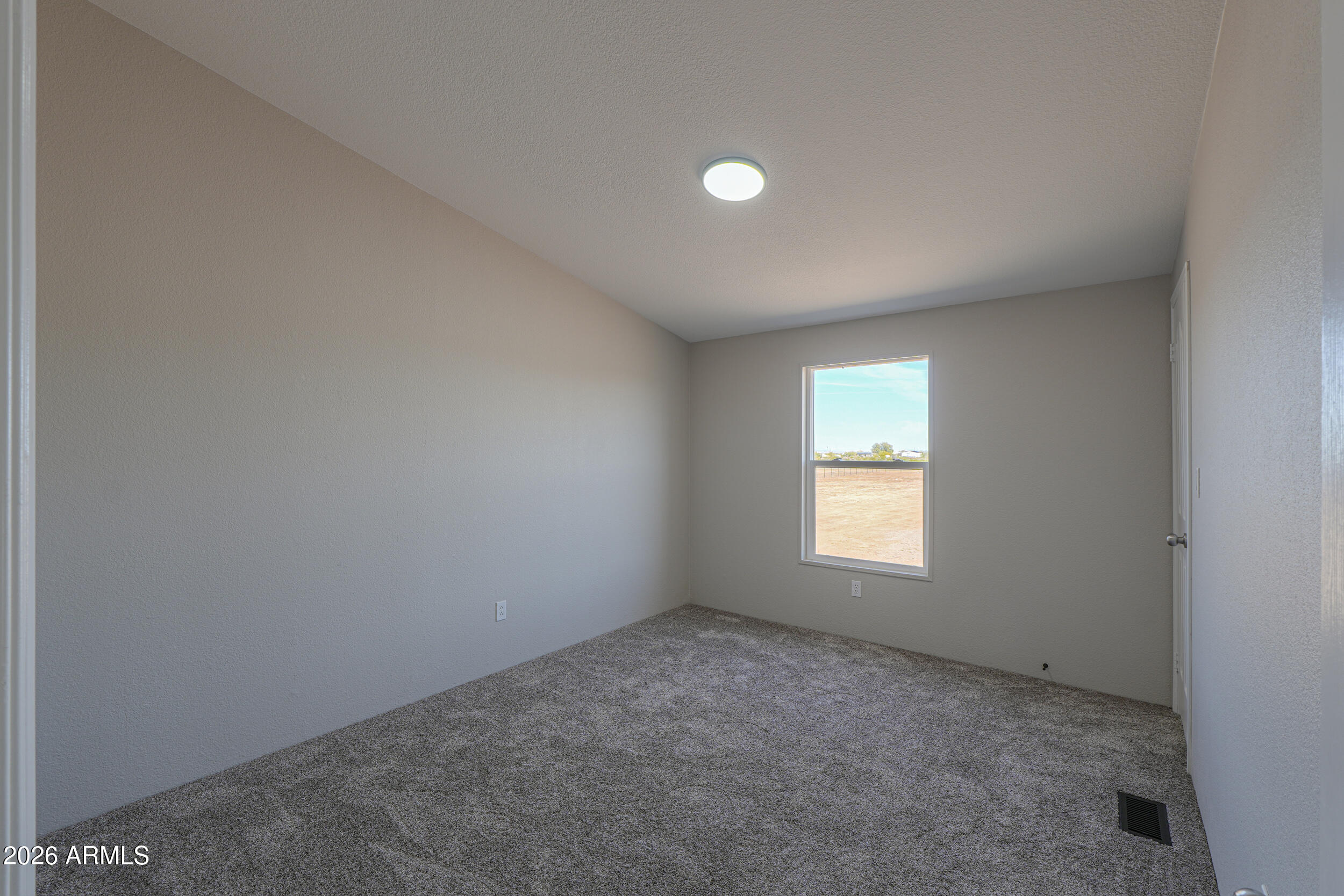 161 North Pueblo Road Maricopa, AZ 85139 - Photo 38 of 79 a view of empty room with window