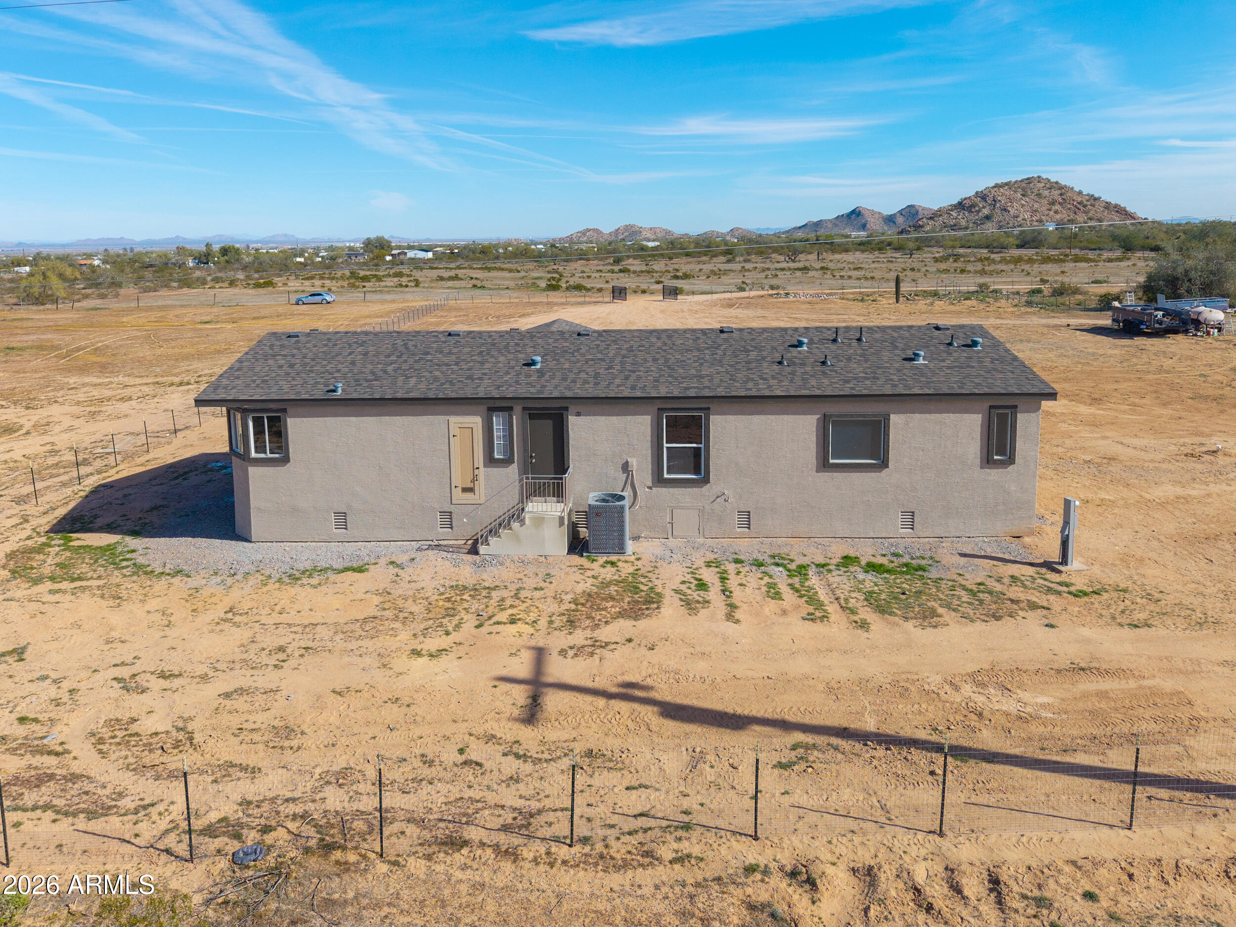 161 North Pueblo Road Maricopa, AZ 85139 - Photo 54 of 79 a view of a terrace with a lake view
