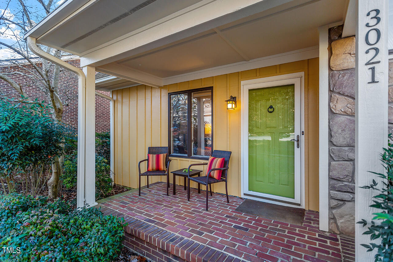 3021 Rue Sans Famille Raleigh, NC 27607 - Photo 4 of 33 a view of a room with furniture and outdoor space
