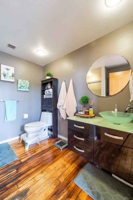 1 Envelope Terrace, Unit 309 Worcester, MA 01604 - Photo 13 of 18 a bedroom with a bed and a mirror