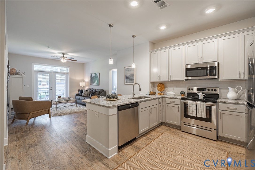 10525 Stony Blf Drive, Unit 201 Ashland, VA 23005 - Photo 28 of 35 Kitchen with appliances with stainless steel finis