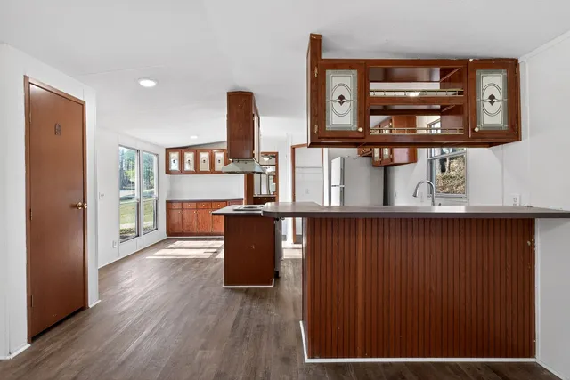 a view of workspace with wooden floor
