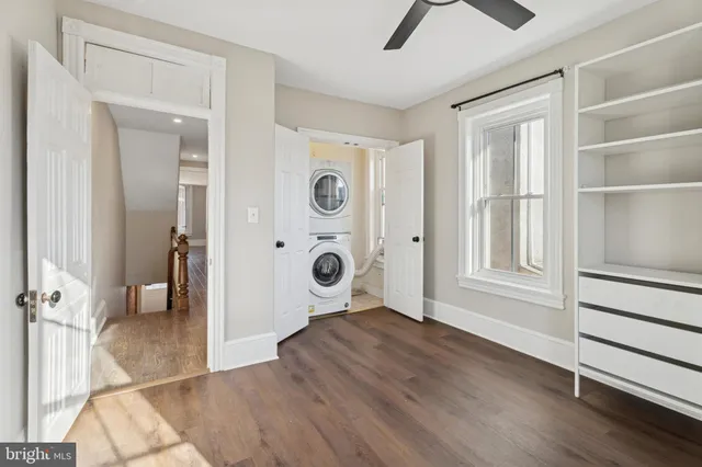 a view of an empty room with a bathroom