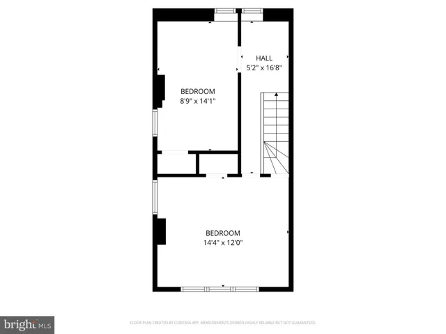 a picture of a bench in front of a wall