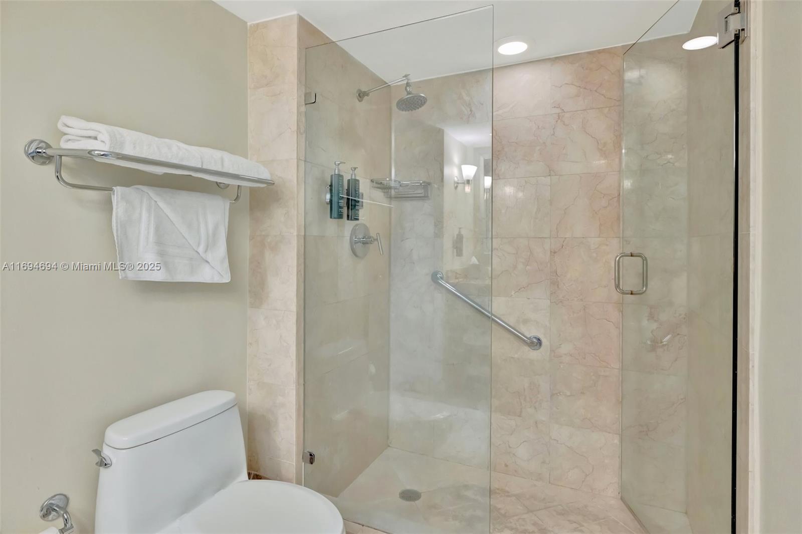 2670 East Sunrise Boulevard, Unit 905 Fort Lauderdale, FL 33304 - Photo 41 of 58 a bathroom with a shower and toilet