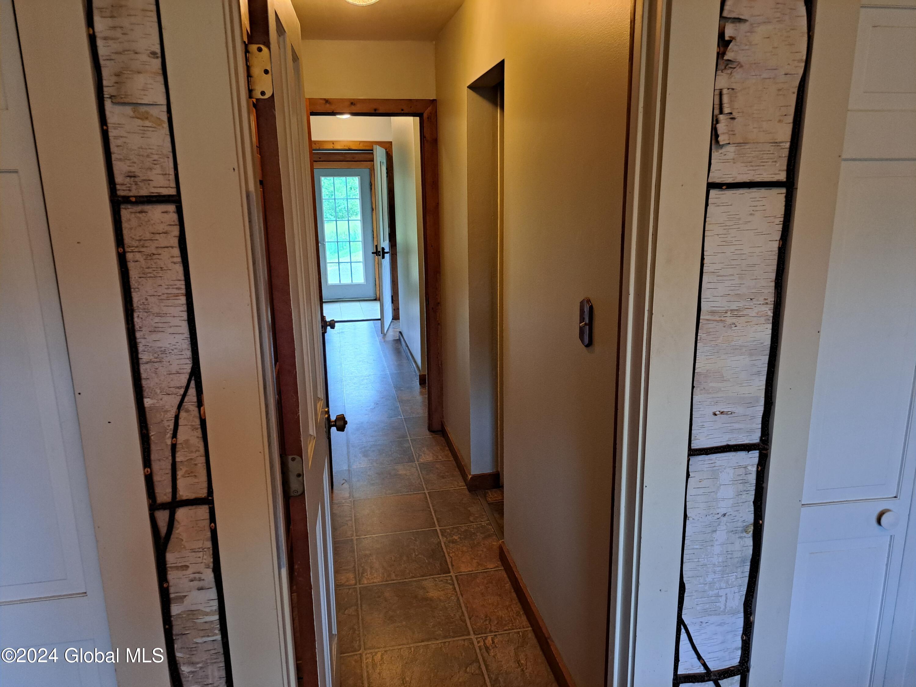 51 Barney Hill Road Johnsburg, NY 12843 - Photo 14 of 108 14 Hallway to Full Bath and Laundry