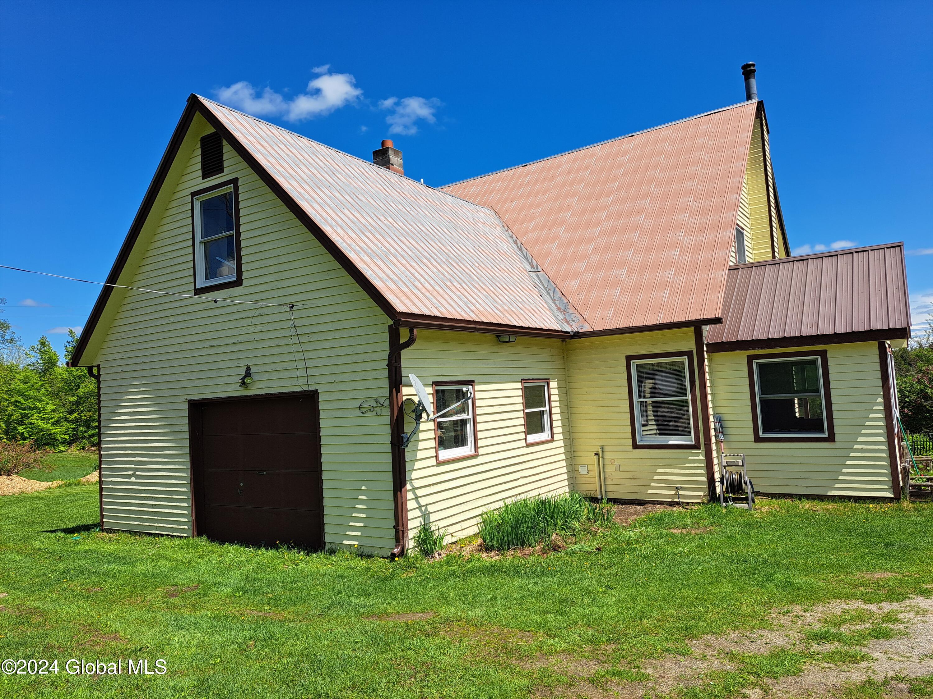 51 Barney Hill Road Johnsburg, NY 12843 - Photo 28 of 108 28 Rear-North Side with Attached Garage