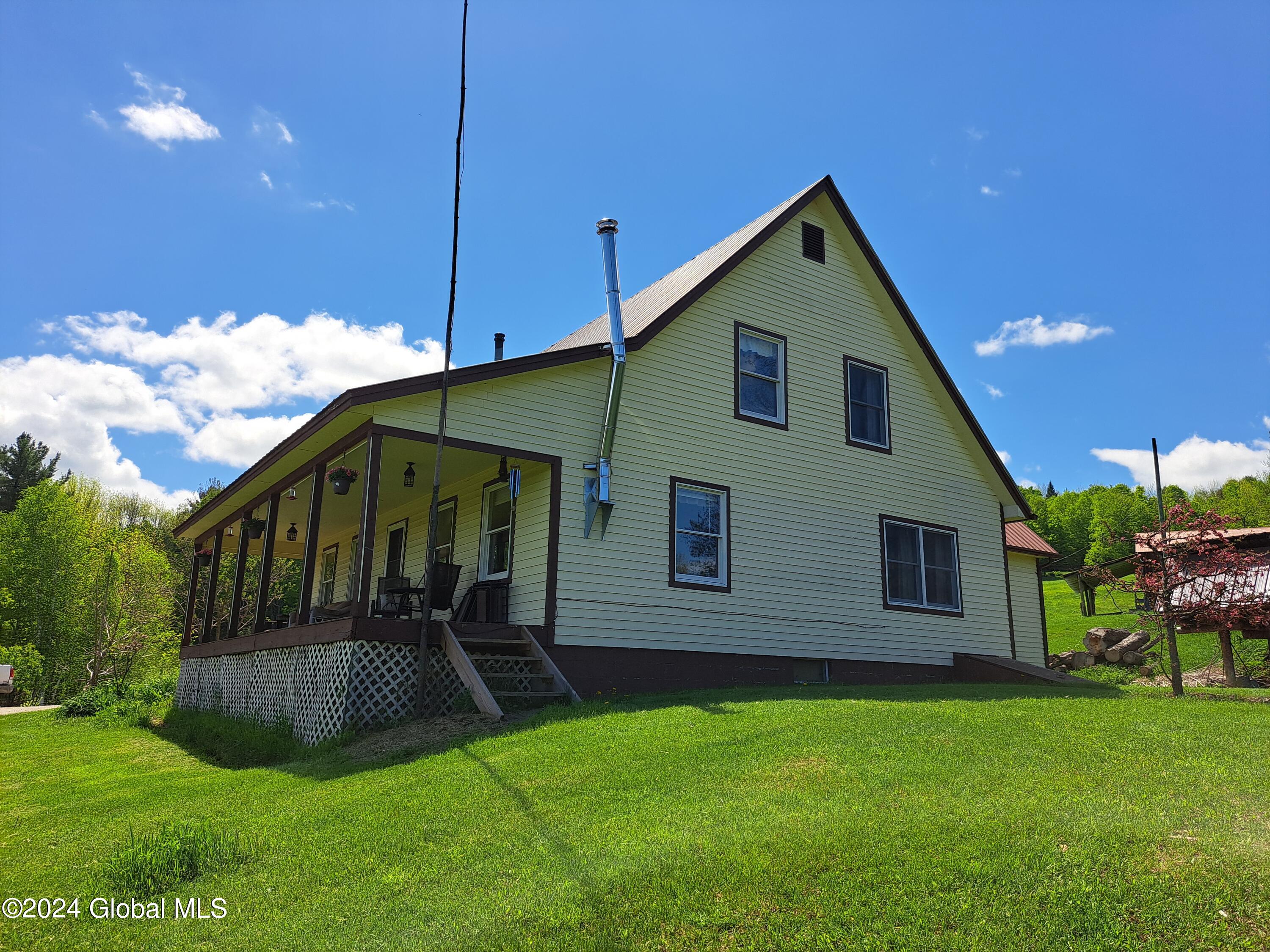 51 Barney Hill Road Johnsburg, NY 12843 - Photo 30 of 108 30 Front Porch