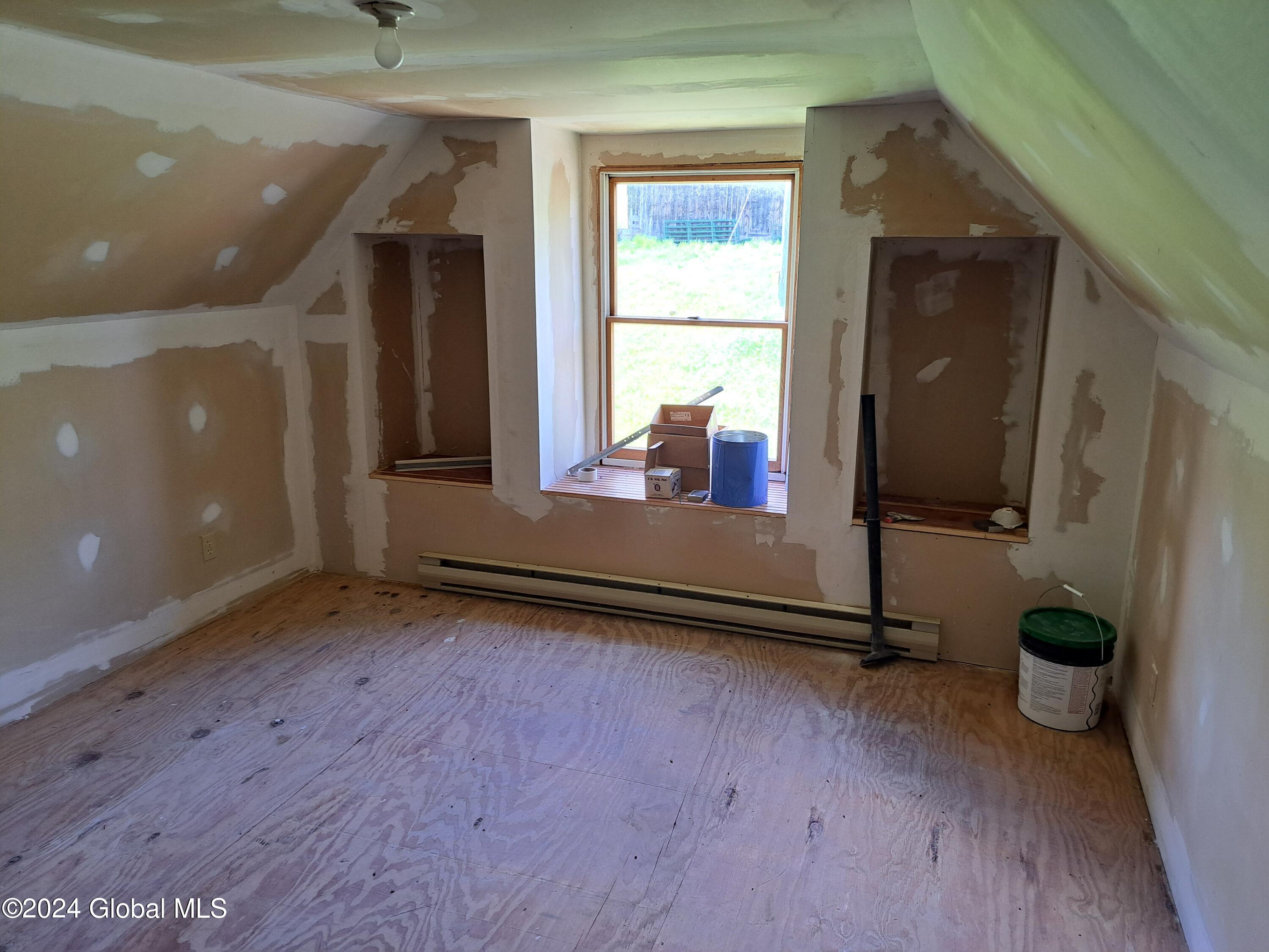 51 Barney Hill Road Johnsburg, NY 12843 - Photo 32 of 108 32 Unfinished Bedroom Above Attached Gar