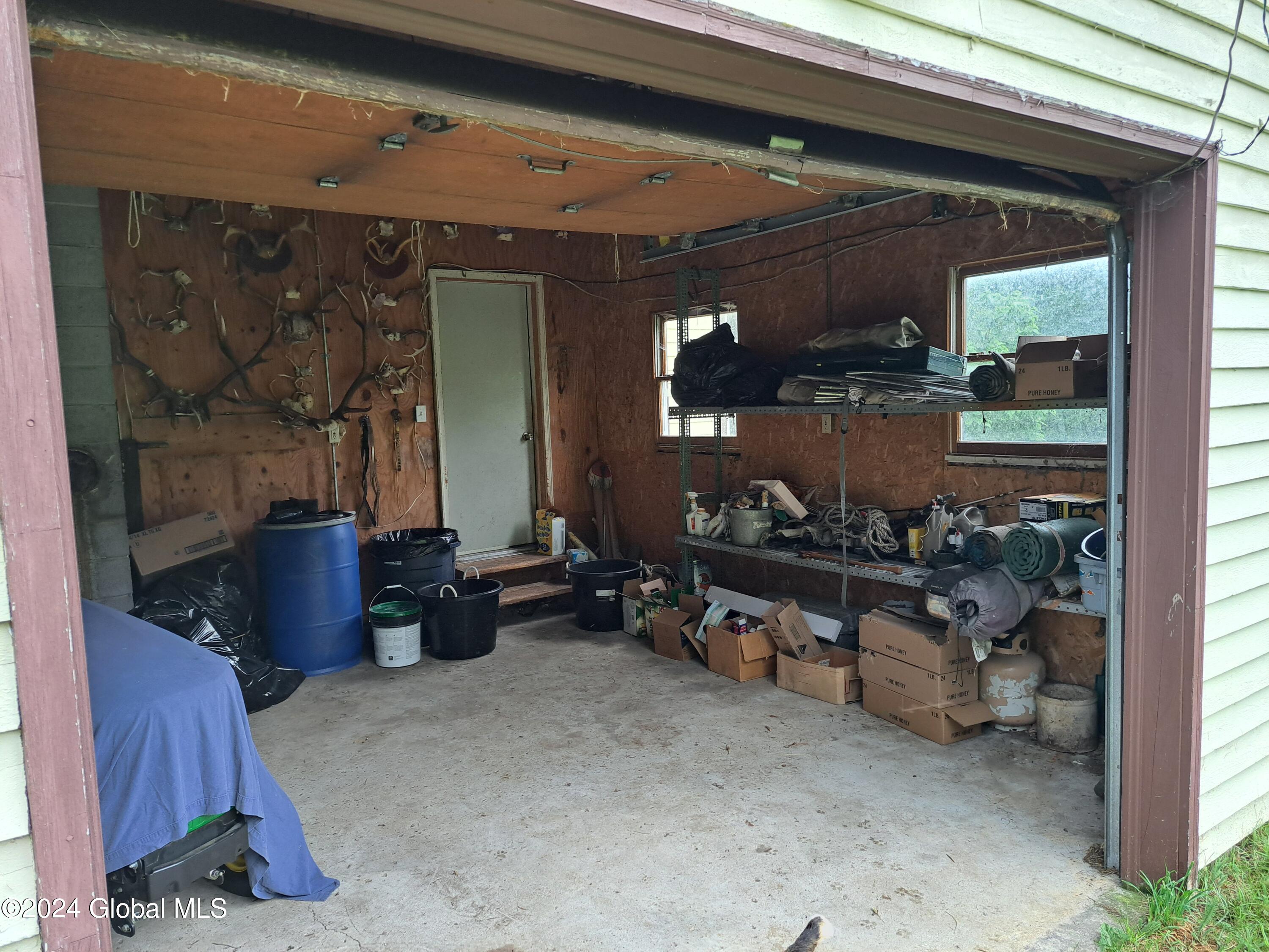 51 Barney Hill Road Johnsburg, NY 12843 - Photo 40 of 108 40 Attached Garage and Door to Laundry