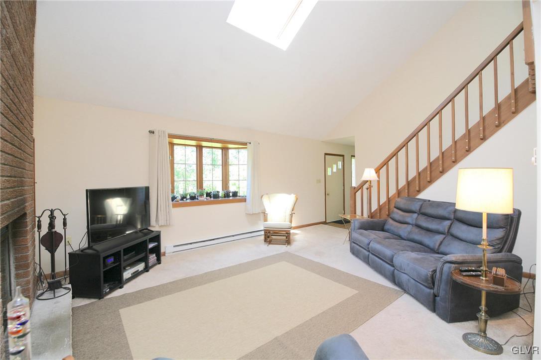 175 Scenic Drive Albrightsville, PA 18210 - Photo 3 of 24 a living room with furniture and a flat screen tv