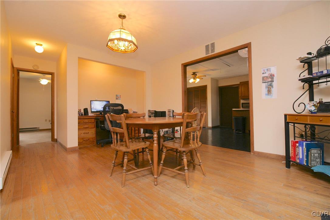 175 Scenic Drive Albrightsville, PA 18210 - Photo 5 of 24 a dining room with furniture and a chandelier