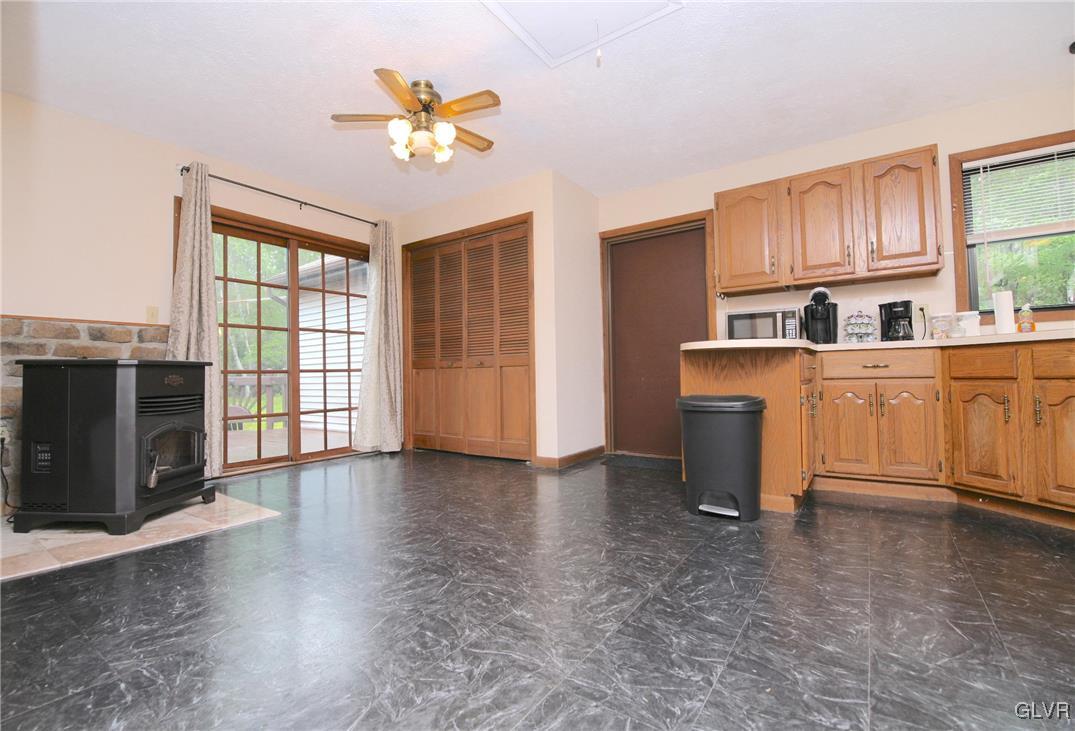 175 Scenic Drive Albrightsville, PA 18210 - Photo 6 of 24 a view of an empty room with a window and kitchen view