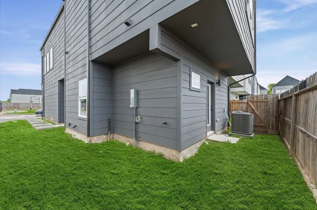 a view of a backyard with potted plants