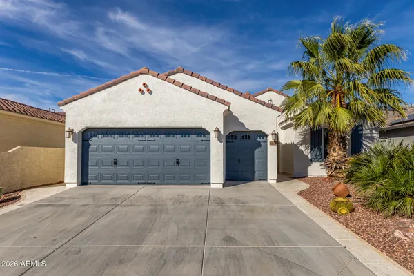 a view of a house with a garage