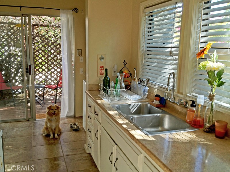 308 Coronado Avenue Long Beach, CA 90814 - Photo 2 of 10 a bathroom with a sink and a mirror