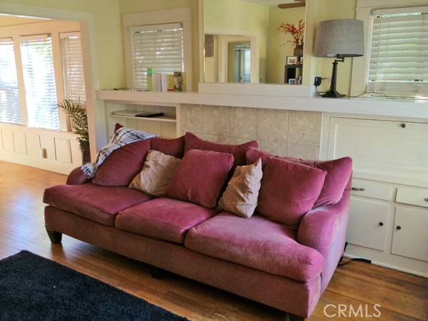 308 Coronado Avenue Long Beach, CA 90814 - Photo 4 of 10 a living room with furniture and a fireplace