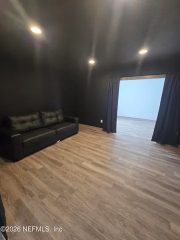 a bedroom with a bed and a fireplace