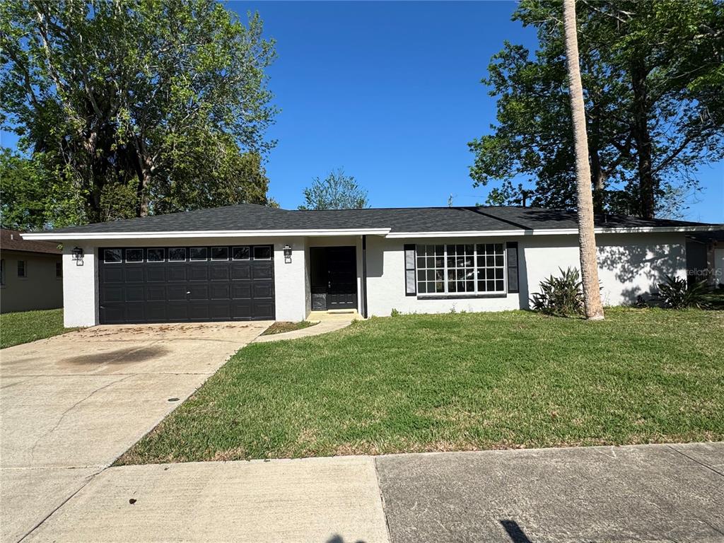 1643 Jacobs Road South Daytona, FL 32119 - Photo 1 of 1 front view of a house with a yard