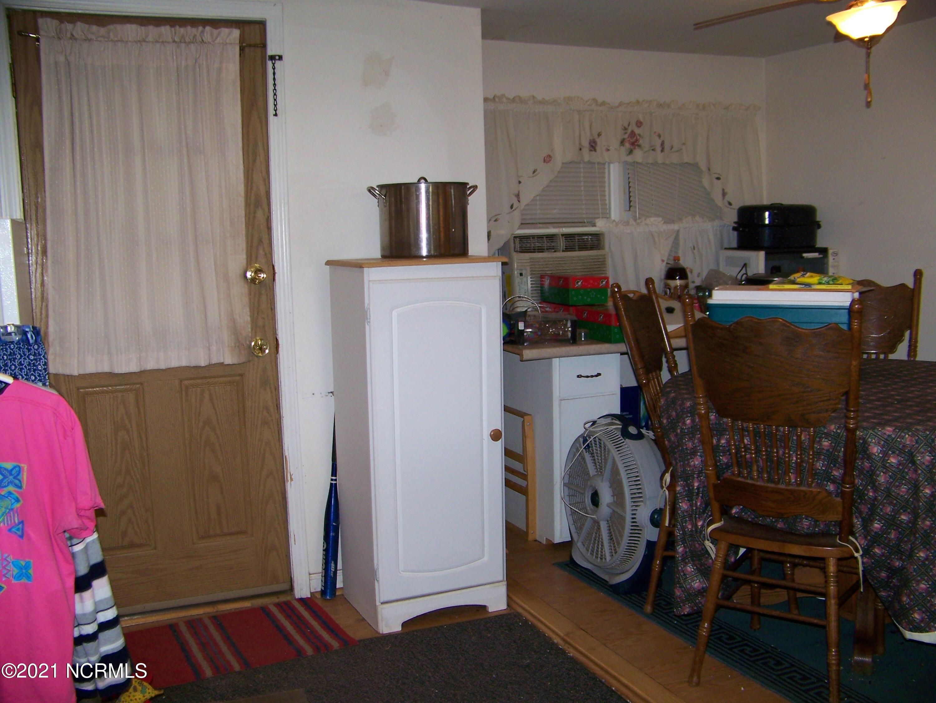 261 Shore Road Newport, NC 28570 - Photo 12 of 31 Back door and dining area