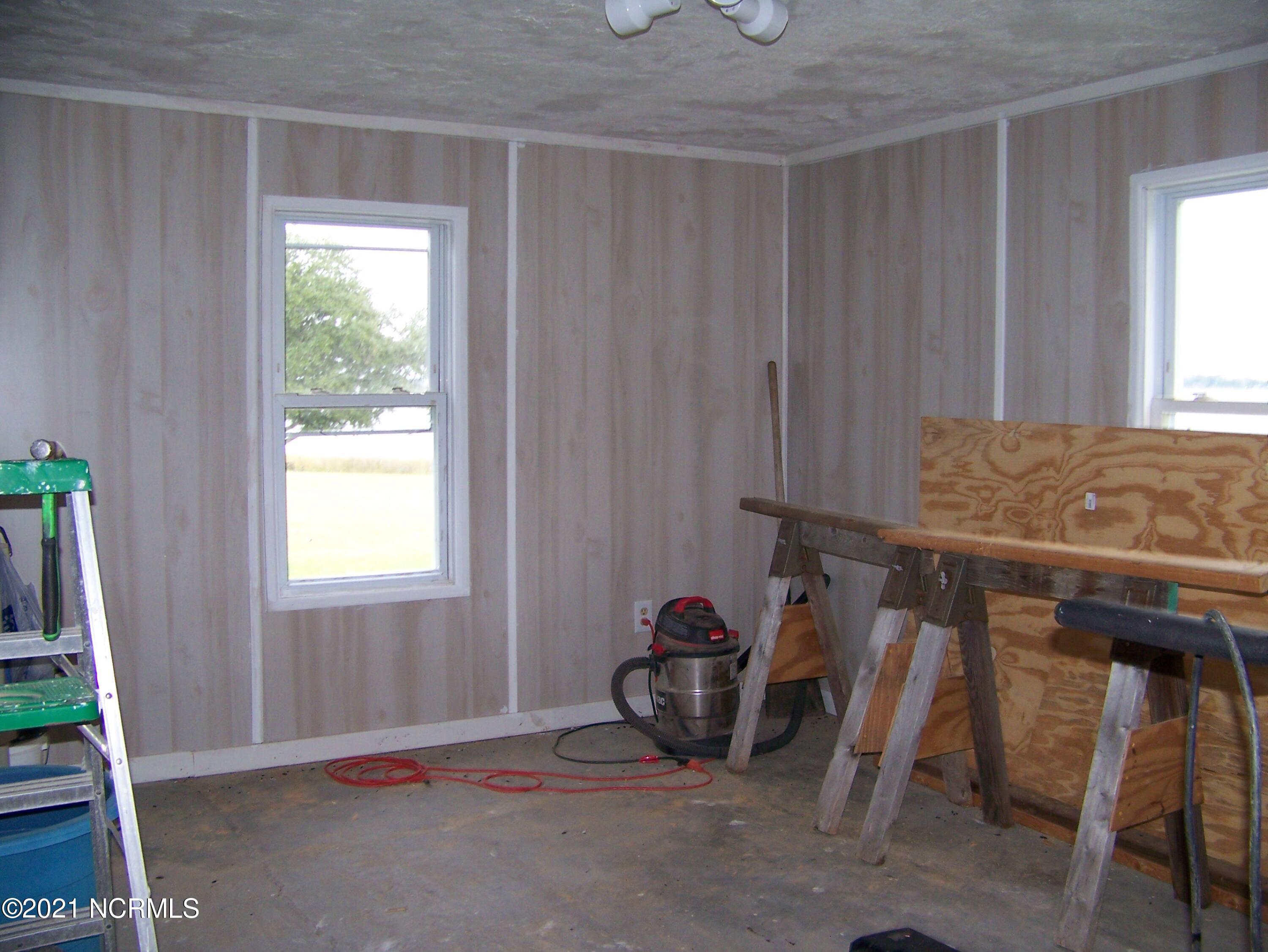 261 Shore Road Newport, NC 28570 - Photo 9 of 31 Front room partially renovated