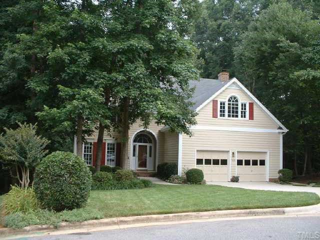 1105 Canoga Place Raleigh, NC 27615 - Photo 1 of 1 a view of a white house with a yard and large trees