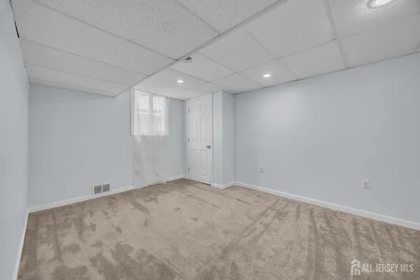 en empty room with windows