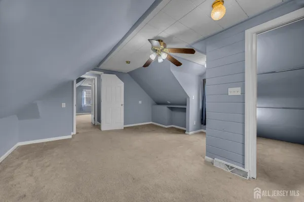 a view of a livingroom with a staircase