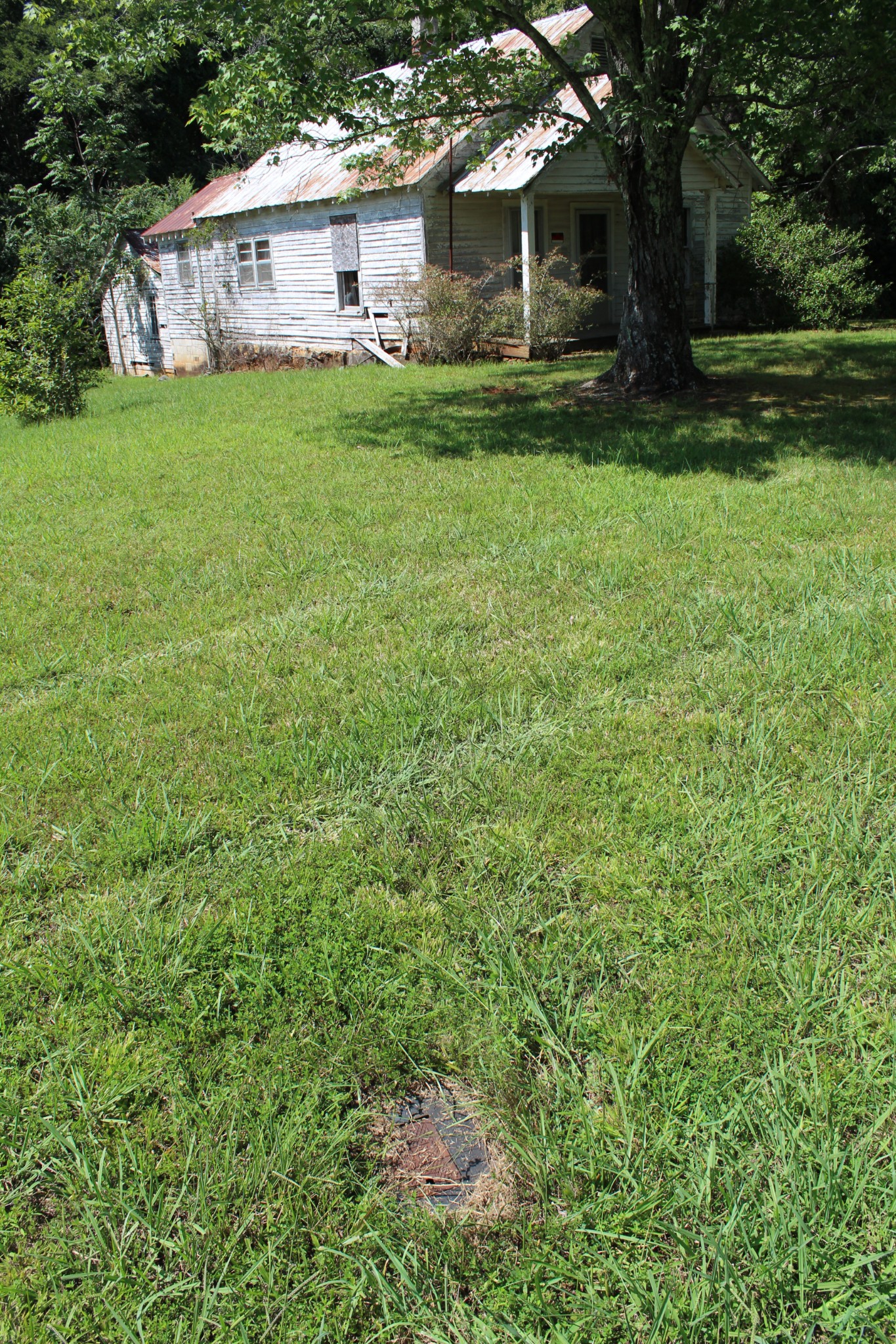 Undisclosed Address McMinnville, TN 37110 - Photo 3 of 3 a view of a house with a yard and sitting area