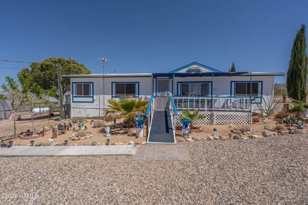 a view of a house with a patio