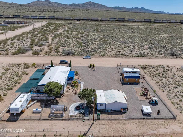 an aerial view of a house with lake view