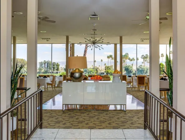 a view of swimming pool with outdoor seating