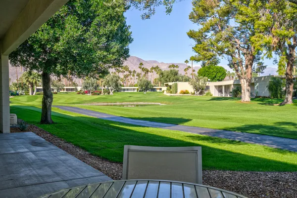 a view of a golf course with a big yard
