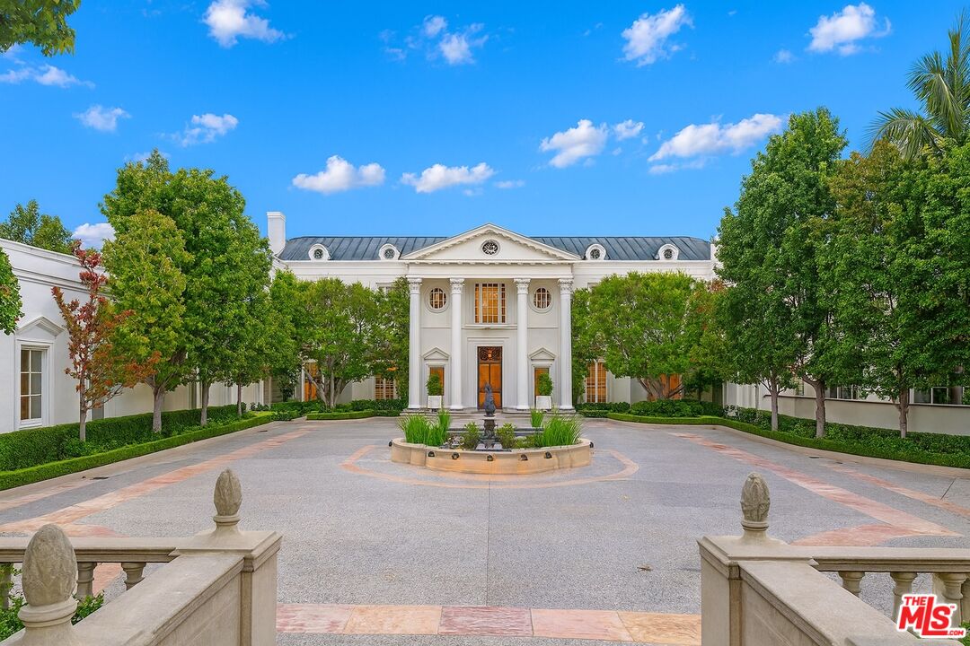 10644 Bellagio Road Los Angeles, CA 90077 - Photo 2 of 3 a front view of a house with a yard