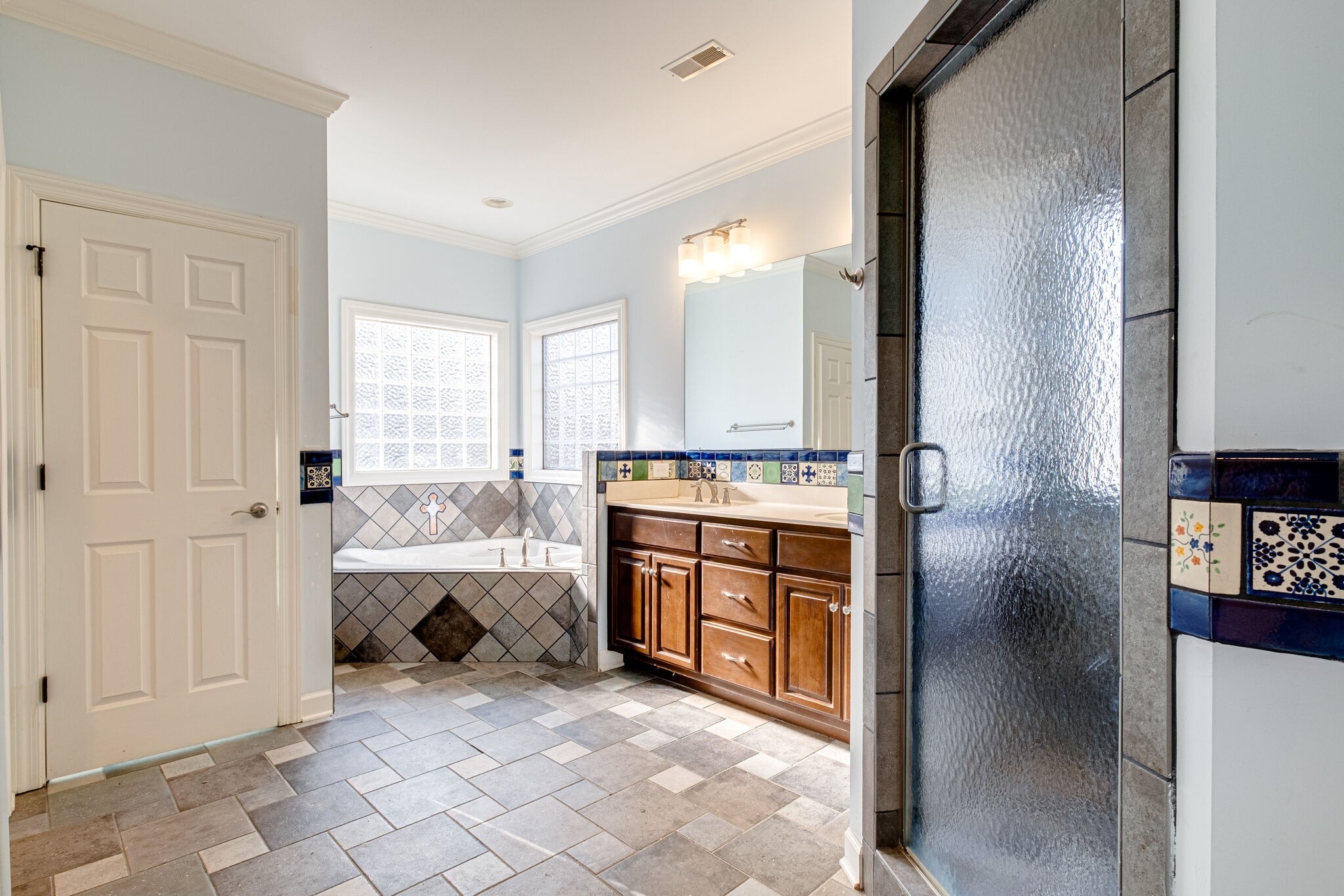 576 Swamp Road Eagleville, TN 37060 - Photo 18 of 27 a large white kitchen with sink and cabinets