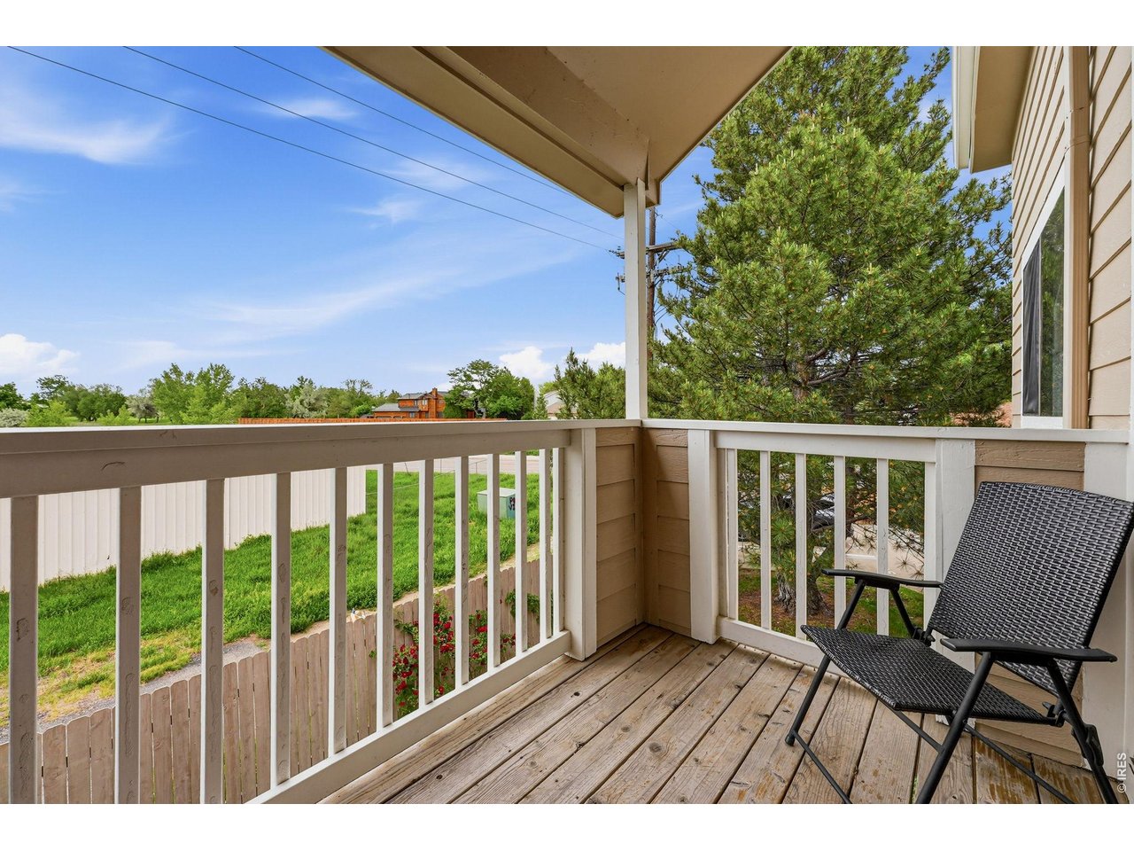 4985 Twin Lakes Road, Unit 94 Boulder, CO 80301 - Photo 16 of 29 The northwest-facing balcony boasts big skies and foothill views.