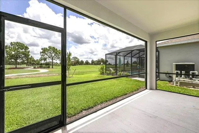a view of a porch with a big yard