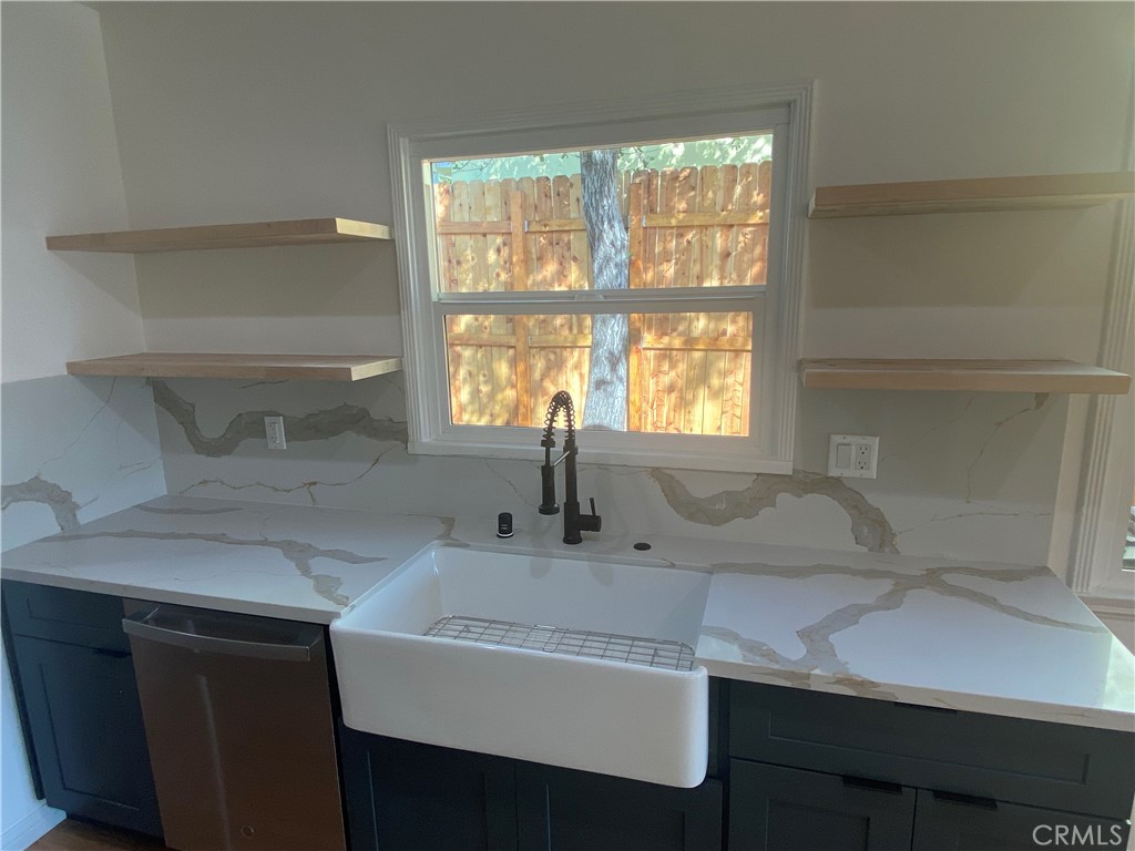 775 Morada Place Altadena, CA 91001 - Photo 17 of 32 a bathroom with a sink and a window