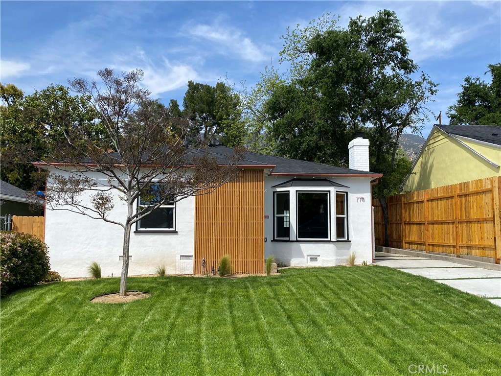 775 Morada Place Altadena, CA 91001 - Photo 32 of 32 a backyard of a house with seating space