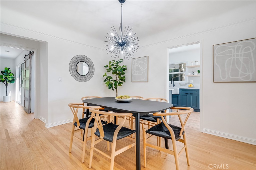 775 Morada Place Altadena, CA 91001 - Photo 4 of 32 a view of a dining room with furniture and wooden floor