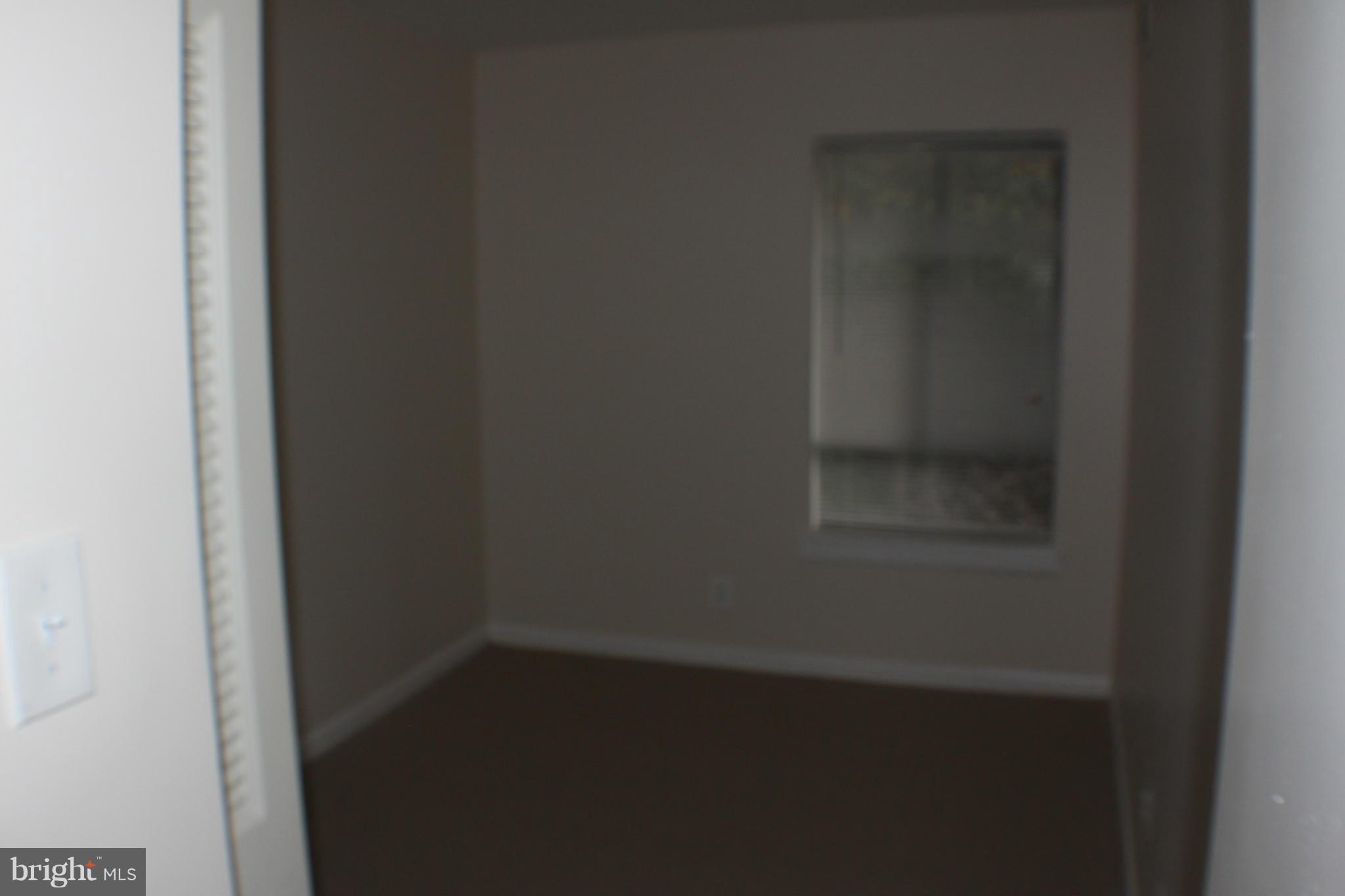 11627 Stoneview Square, Unit 21C Reston, VA 20191 - Photo 16 of 19 a small space with a window