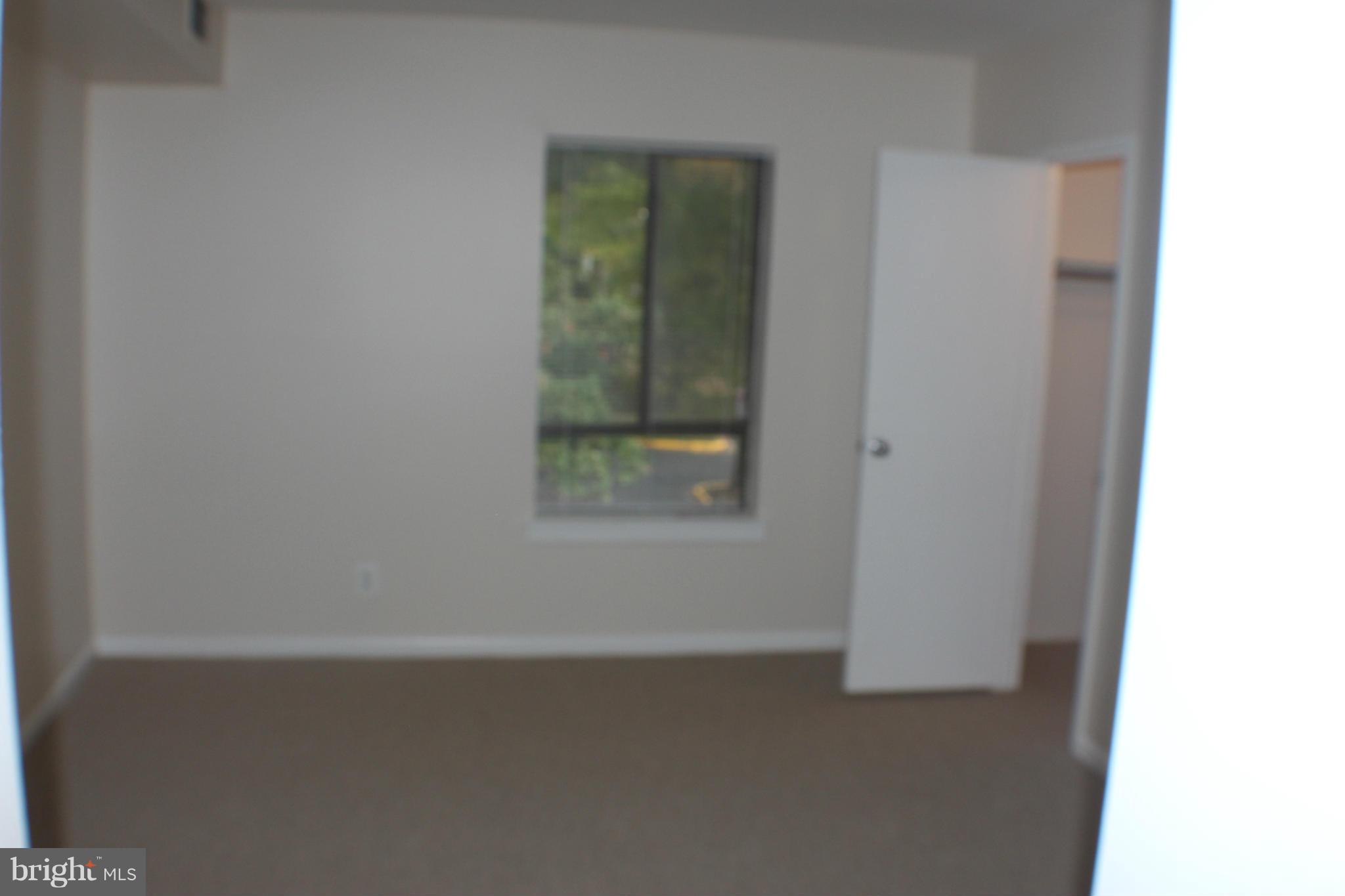 11627 Stoneview Square, Unit 21C Reston, VA 20191 - Photo 17 of 19 a small space with a window
