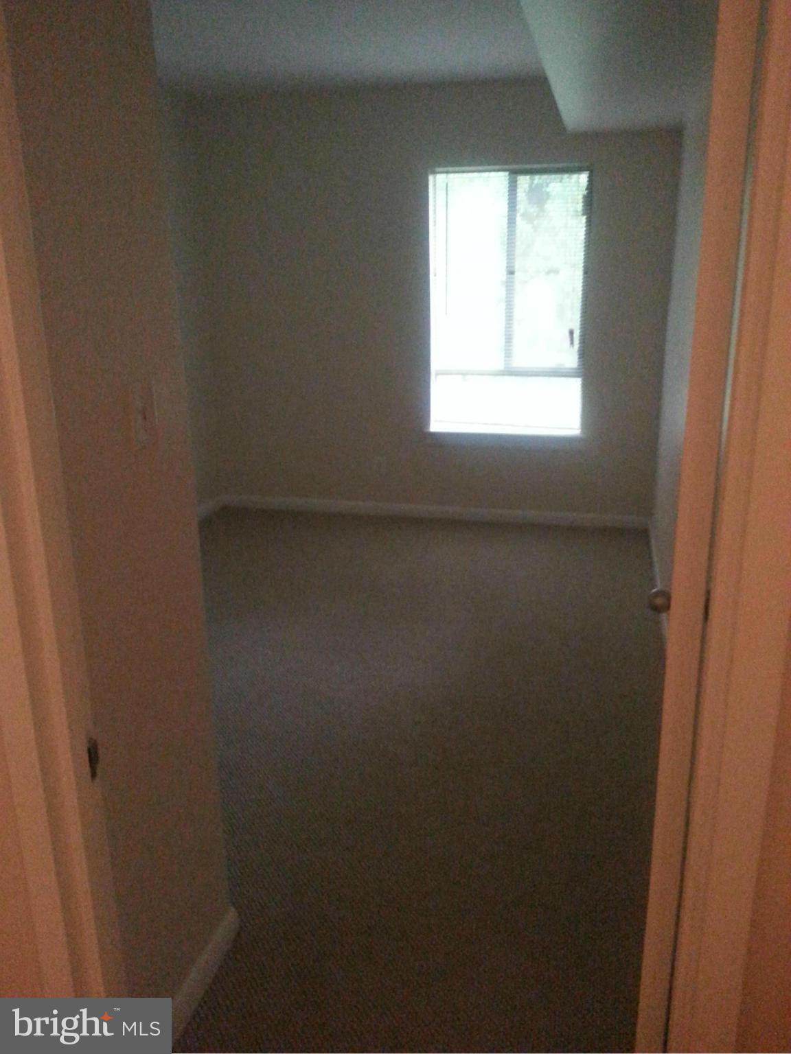 11627 Stoneview Square, Unit 21C Reston, VA 20191 - Photo 8 of 19 a view of a room that has a window in it